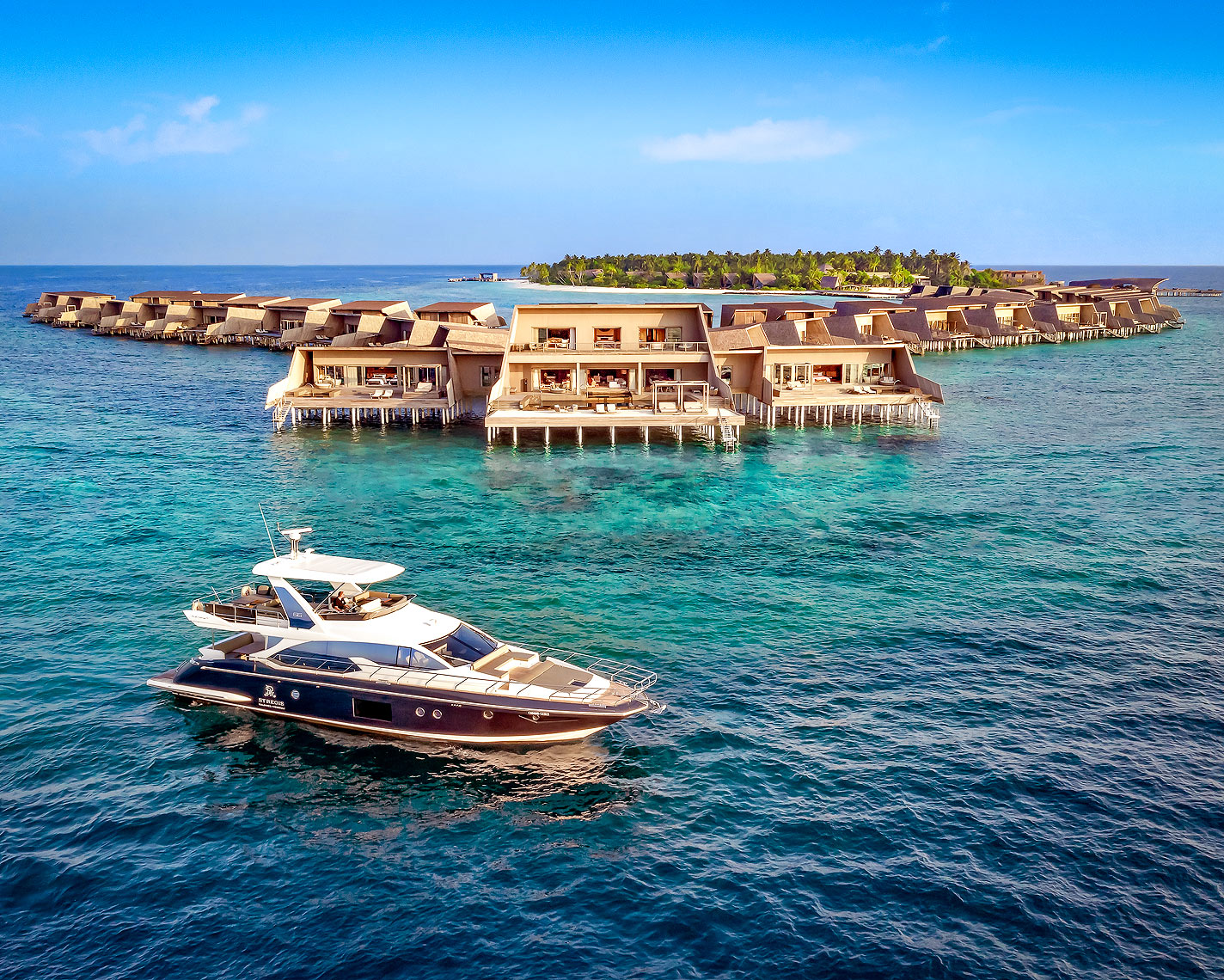 St. Regis Resort Hotel, Maldives - Norma Luxury Yacht and overview of property